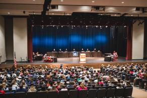 Appeals on Wheel event in high school auditorium  